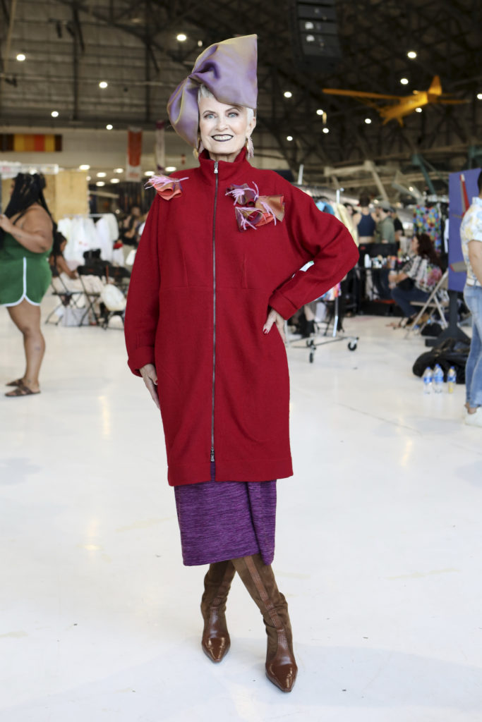 StyleCrone's Judith Boyd in a custom design by Brooks LTD modeled backstage at Latin Fashion Week Colorado