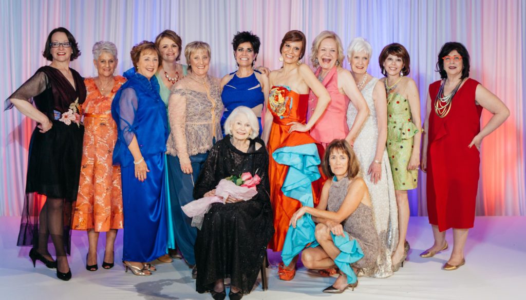 the 2015 Sue Miller Day of Caring runway lineup wearing Brooks LTD